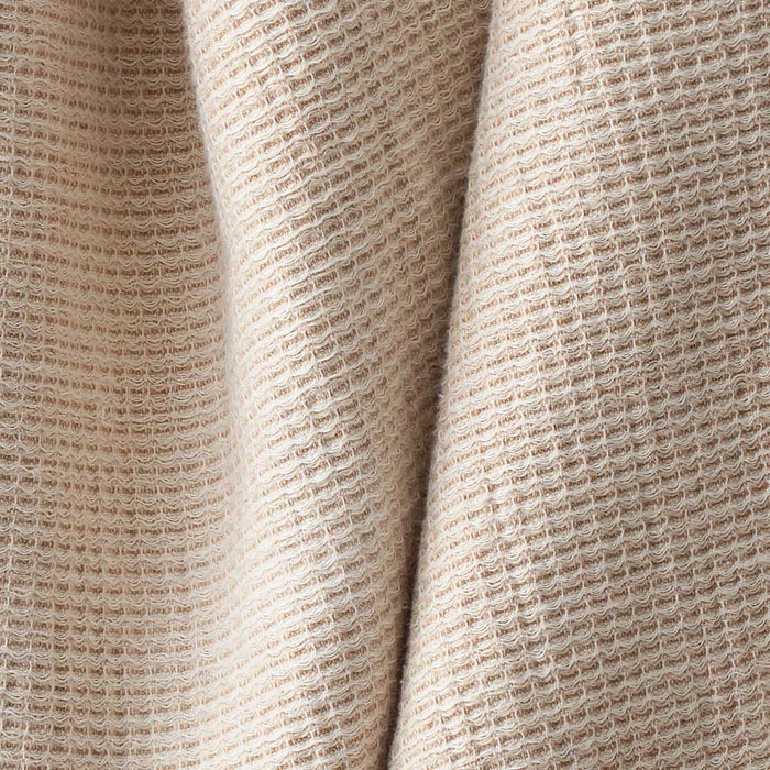 Detail of warm tan cotton spa towel, tan