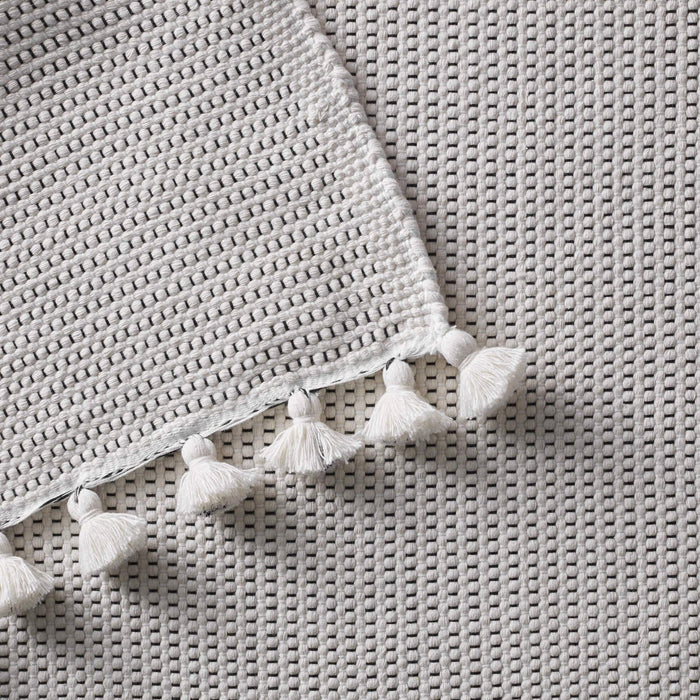 Cream bath rug tassles, ivory