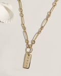 Gold paperclip chain necklace with personalized name tag pendant
