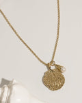 james-michelle-capri-shell-necklace-gold-main-flat-lay