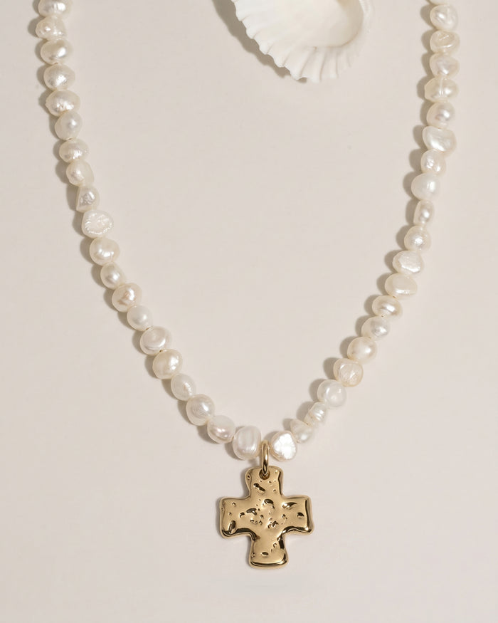james-michelle-chunky-cross-pearl-necklace-gold-pearl-main-flat-lay