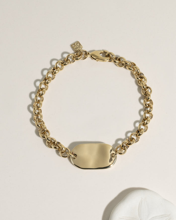 Gold chunky rolo chain bracelet with rectangular polished ID plate