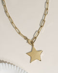 Gold chunky paperclip chain necklace with large solid polished star pendant
