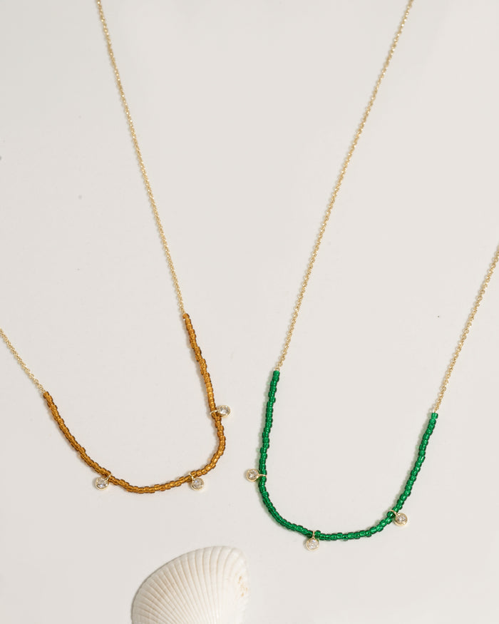 Beaded necklace with mixed crystal and gold bead accents