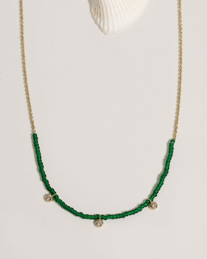 Beaded necklace with mixed crystal and gold bead accents
