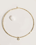 Gold rigid collar necklace with crystal accents