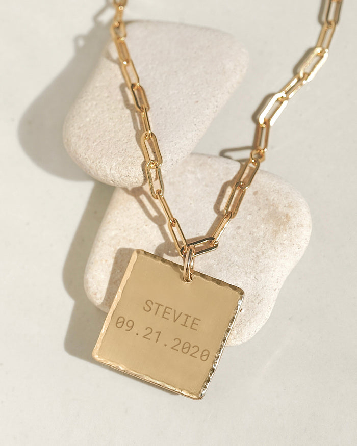 Custom square initial necklace with engraved letter in gold, product photo