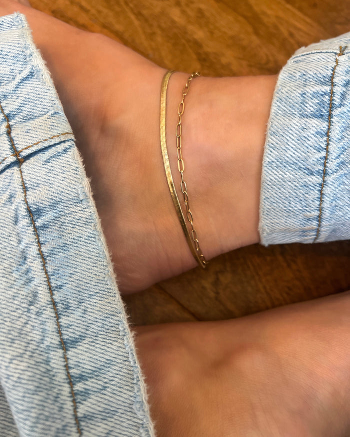 Two-layer gold anklet set combining flat herringbone chain and paperclip link chain