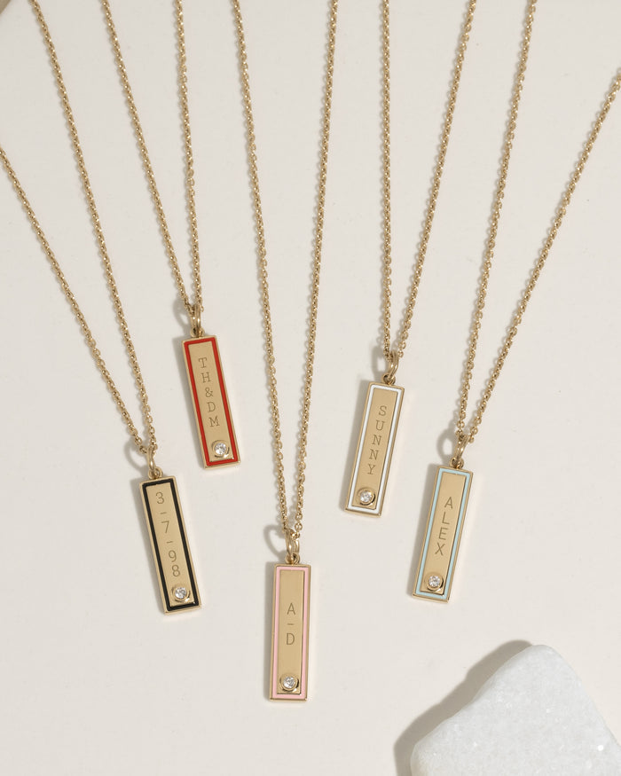 Gold enamel bar necklaces in assorted colors with custom engraving