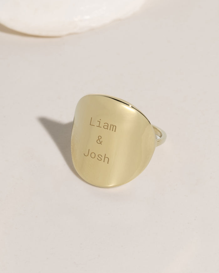 Gold large disc ring with personalized engraving