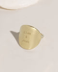Gold large disc ring with personalized engraving