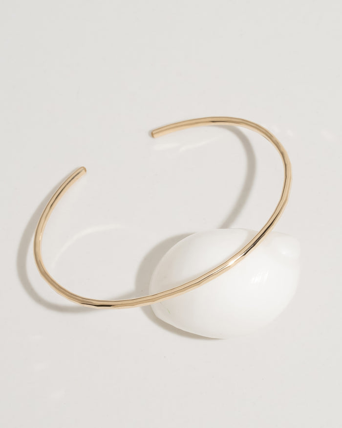 Gold open cuff bracelet with hammered texture