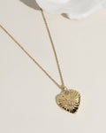 Gold necklace with a locket pendant