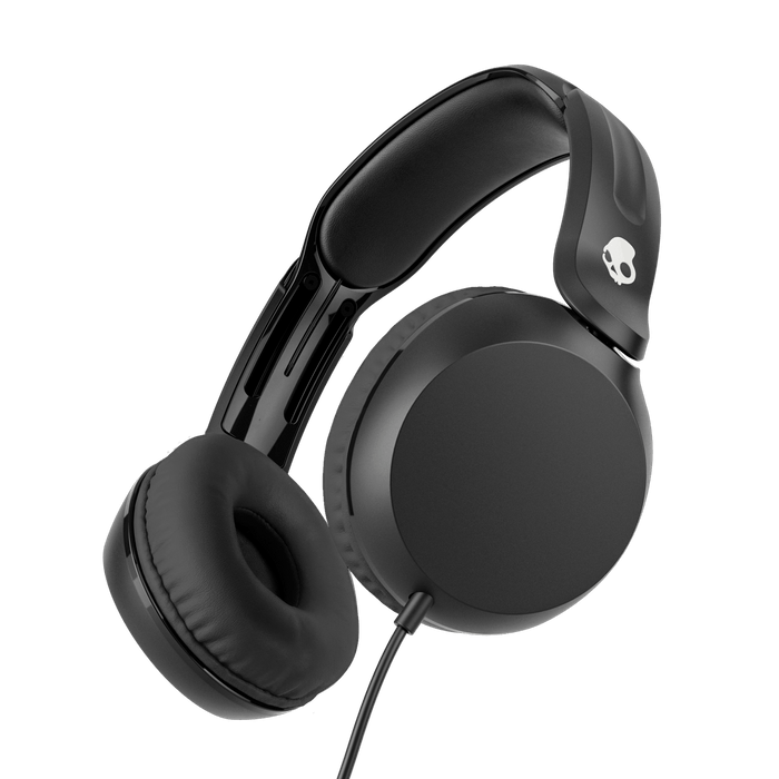 Black over-ear wired headphones with cushioned ear pads and a padded headband, shown at an angle on a solid black background. A small white skull logo is visible on the headband. |True Black