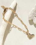 Gold paperclip chain bracelet with engraved heart charm