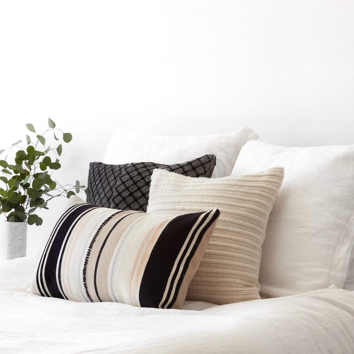 Trio of Pillows Styled on Bed