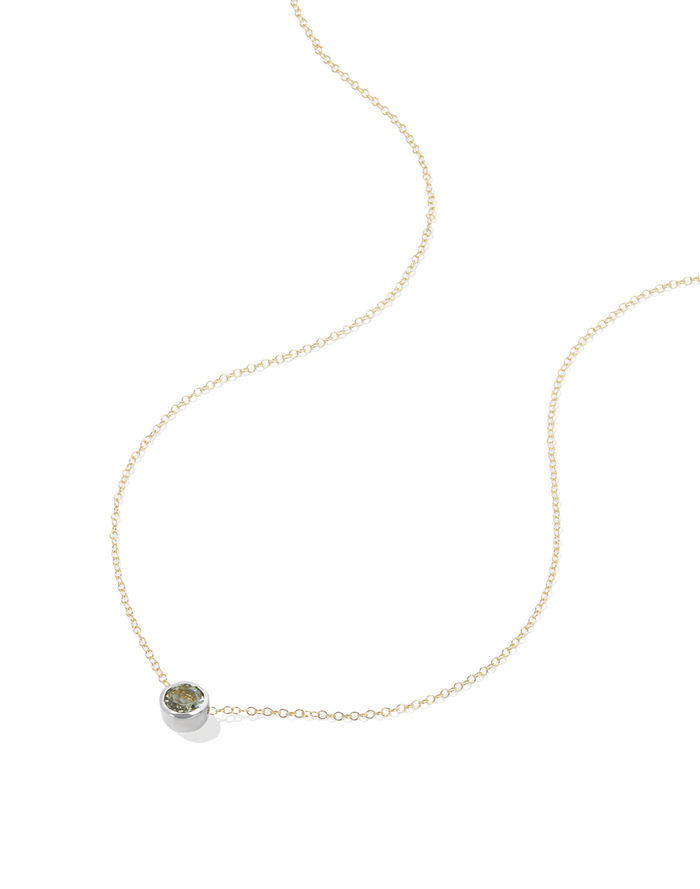 Delicate gold cable chain necklace with tiny aqua gemstone solitaire pendant, alternate view