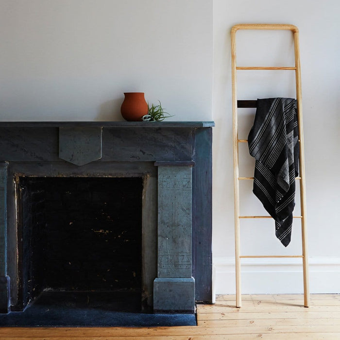 Black and Grey Alpaca Blanket Draped Over Ladder, charcoal