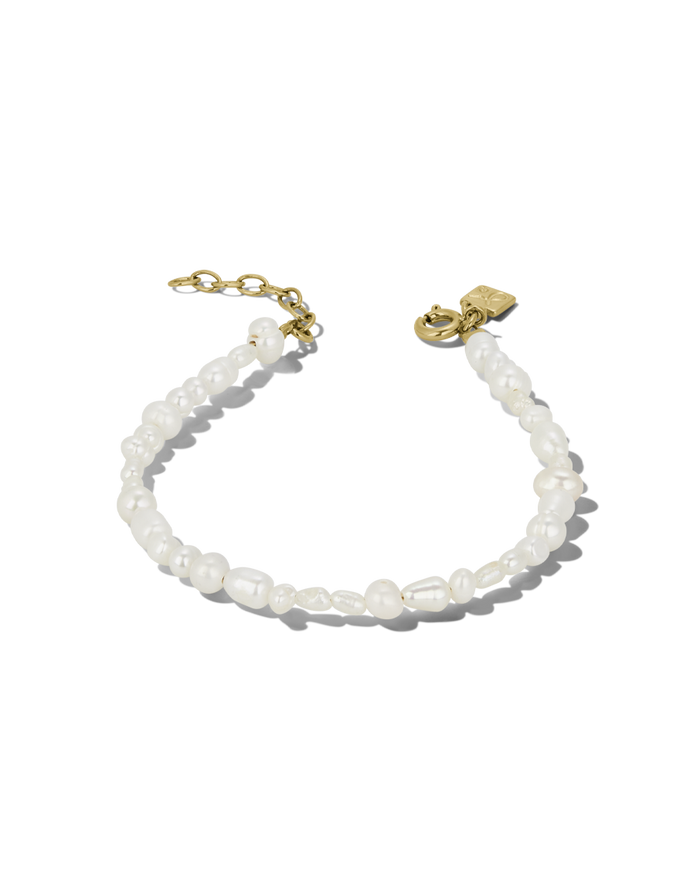 Set of two bracelets: freshwater pearl bead bracelet and gold paperclip chain bracelet with pearl accents, alternate view