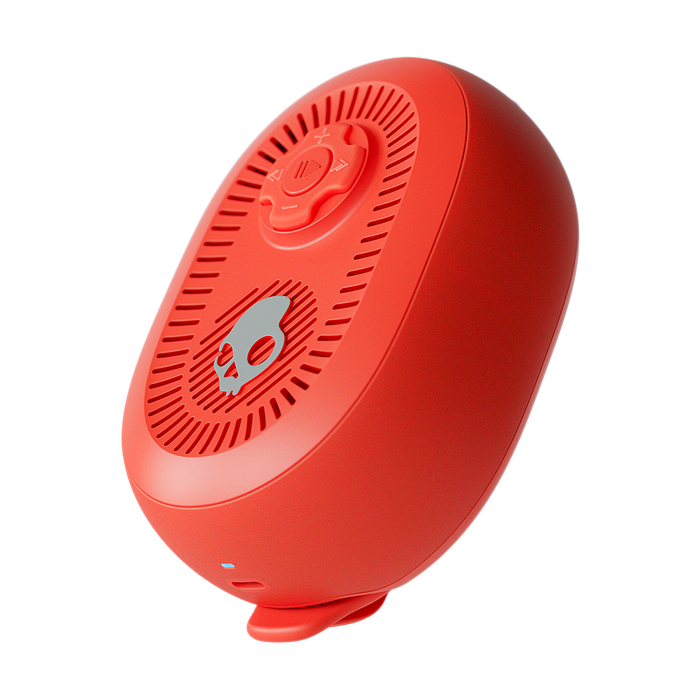 Red portable speaker on a white background | Plasma