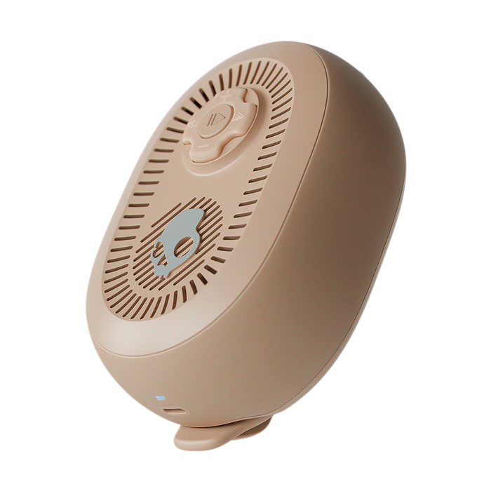 Beige speaker with a white background | Primer