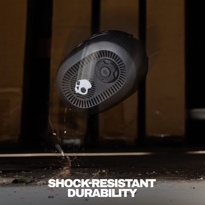 Black speaker with water splashing around it, labeled 'Shock Resistant Durability'. | True Black