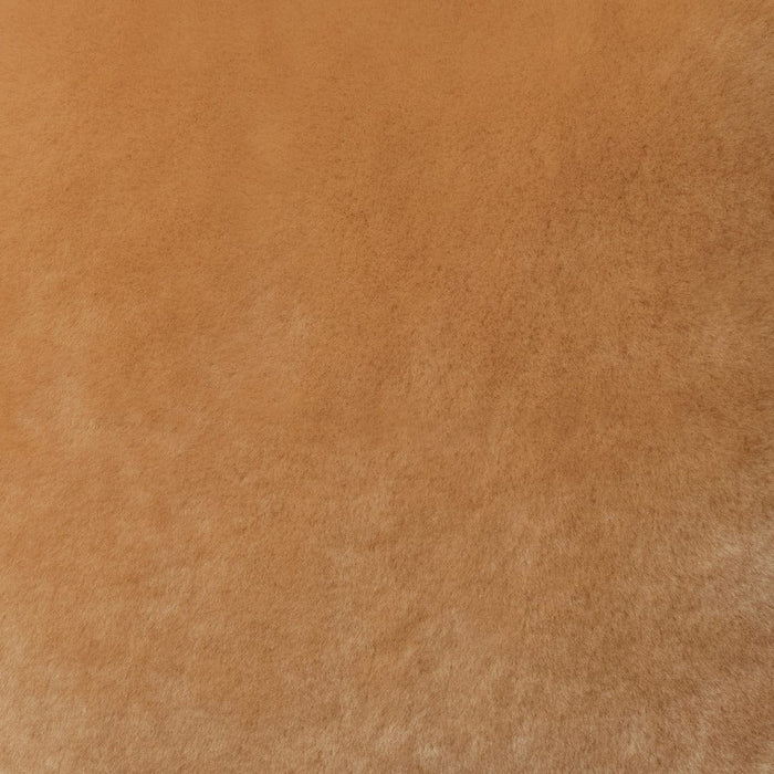 Detail of tan sheepskin pillow