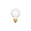 Spherical matte white LED bulb with brass threaded base and black contact point.