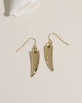 Gold drop earrings with polished talon or horn-shaped pendants on fish hook wires