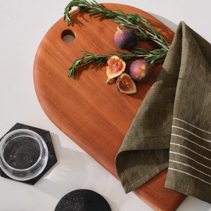 Mahogany serving board with linen napkins and lava rock coasters, mahogany