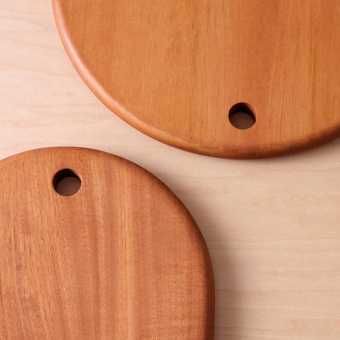 Top edge of mahogany charcuterie boards, mahogany
