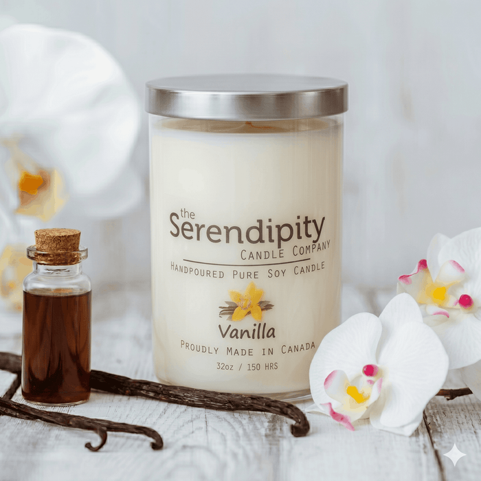 Vanilla candle from Serendipity Candle Company with vanilla beans and flowers on a white background