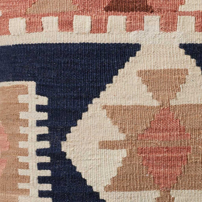 Detail view of pattern on kilim throw pillow, Navy